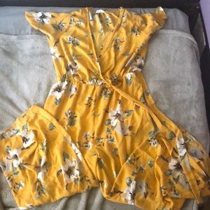 Yellow Romper with white flowers size large